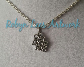 Small Silver Noughts & Crosses Tic Tac Toe Grid Game Charm Necklace on Silver Crossed Chain