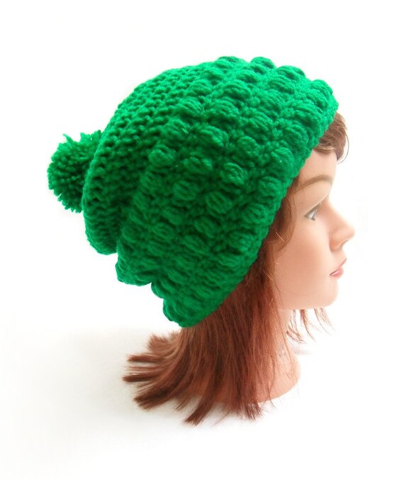 green pom pom hat