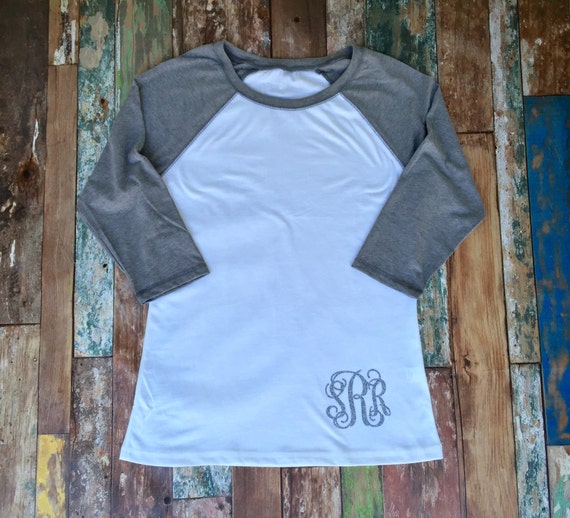 monogram on bottom of shirt