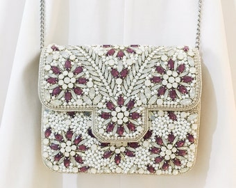 white embellished clutch