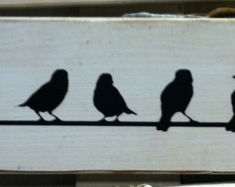 Birds On A Wire Sign