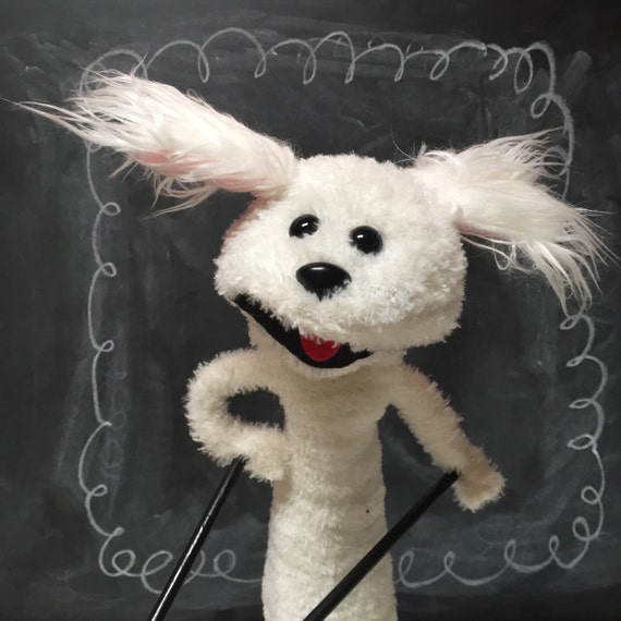 white fluffy dog toy