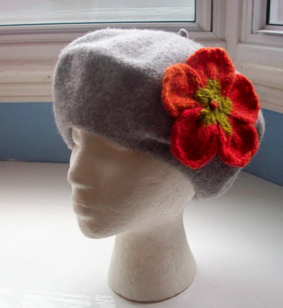 Beret, wool, embellished with large flower pin corsage hand knit shades of orange red
