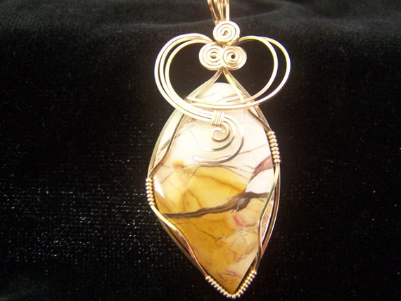 Items similar to wire wrapped pendant on Etsy