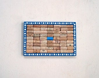 Blue wine cork message board decorated with Stars and Full Moons