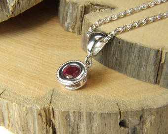 Ruby (6.0mm Natural Ruby), 6mm x 0.80 Carat Round Cut, Sterling Silver Pendant including 18"-20" (Adjustable) Sterling Chain