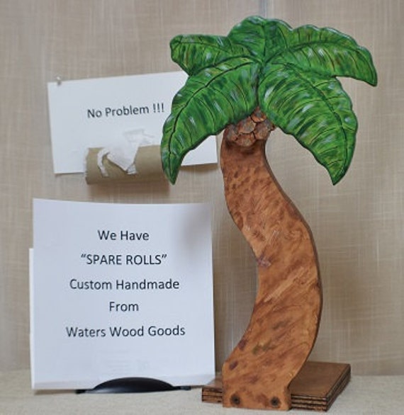 This Coconut Palm Tree Toilet Paper Holder by WatersWoodGoods