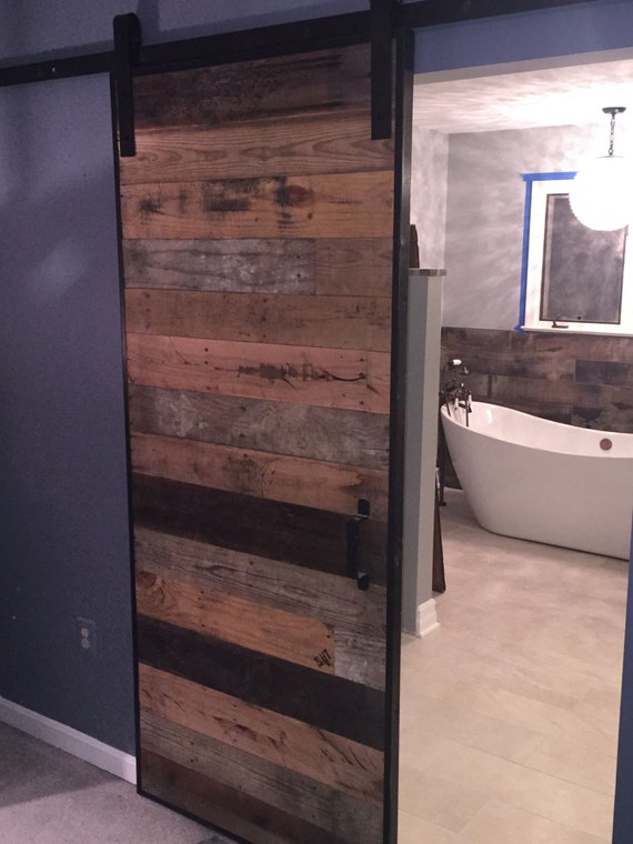 Modern Rustic Sliding Barn Door with Metal Trim by RecoWarehouse