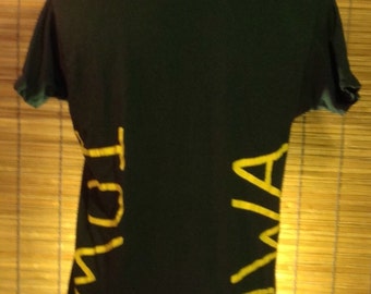 Vintage Large University of Iowa Hawkeyes fan shirt. Black Fruit of the Loom shirt, 100% preshrunk cotton, Made in USA. Pocket-t on front.