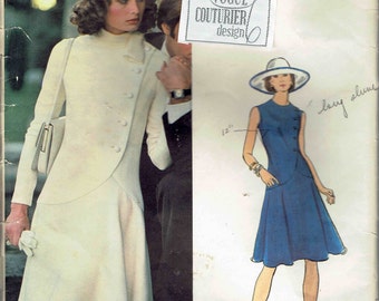 Vogue Couturier Design Fabiani Pattern 1065 with Label . Asymmetrical Button Front Flared Dress with or w/out Sleeve. Size 16 Bust 38 in.