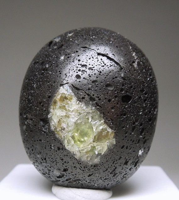 Peridot in Volcanic Lava by AllofHerStones on Etsy