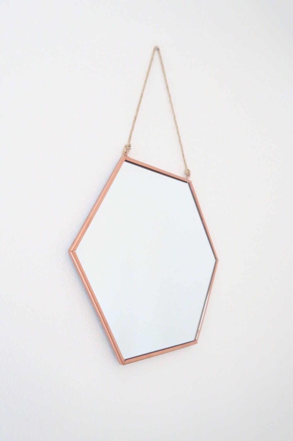 Small hexagonal copper mirror