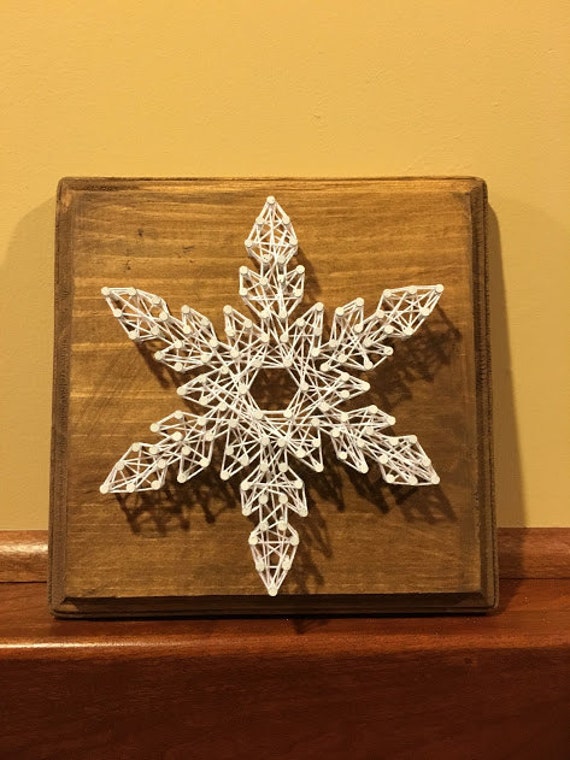 Items similar to Snowflake String Art on Etsy