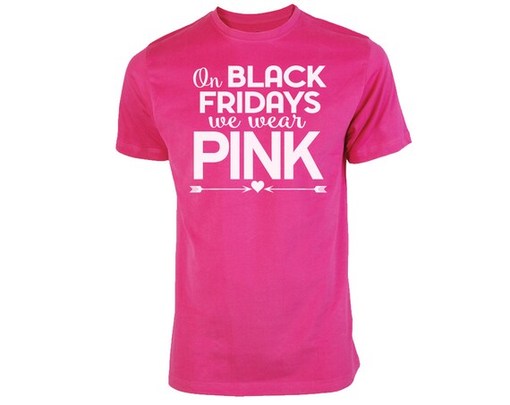 Items similar to On Black Fridays We Wear Pink Shopping Tshirt. Mean ...