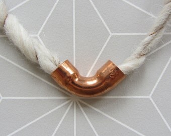 Felted necklace with copper element