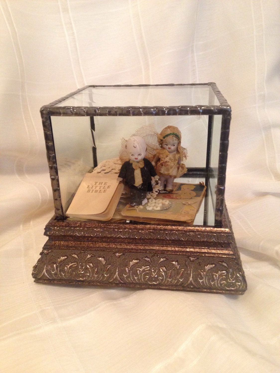 Antique glass case 5 x 5 x 4 high with ornate antique wood