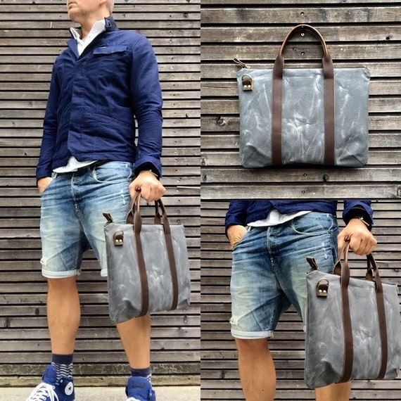 briefcase in waxed canvas and leather COLLECTION UNISEX