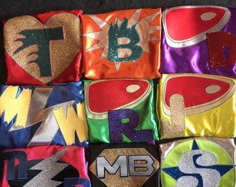 1 ADULT CAPE Colors of your choice. Superhero theme Double Sided Plain Hero Cape Includes Personalized Logo