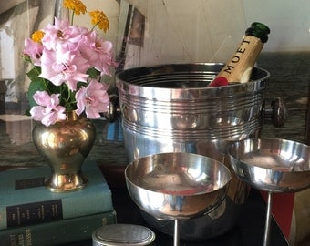 Champagne Bucket and Silver Champagne Glasses. Cordials. Entertain in style