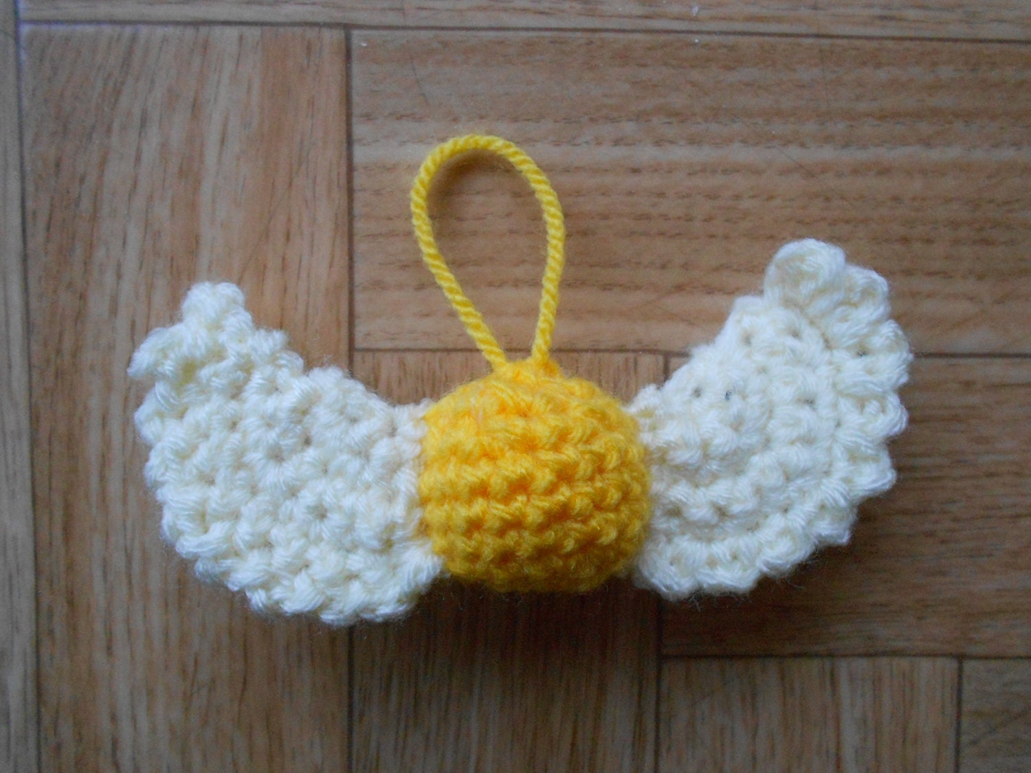 Crochet golden snitch hanging ornament by CuteCreationsByLea