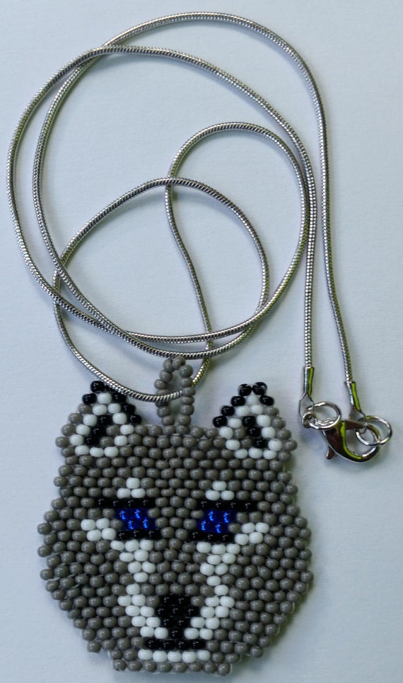 Wolf Medallion Necklace by NativeCooperative on Etsy