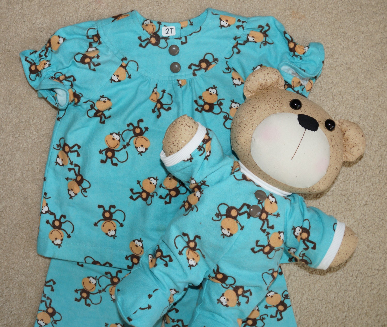 teddy bear wearing pyjamas