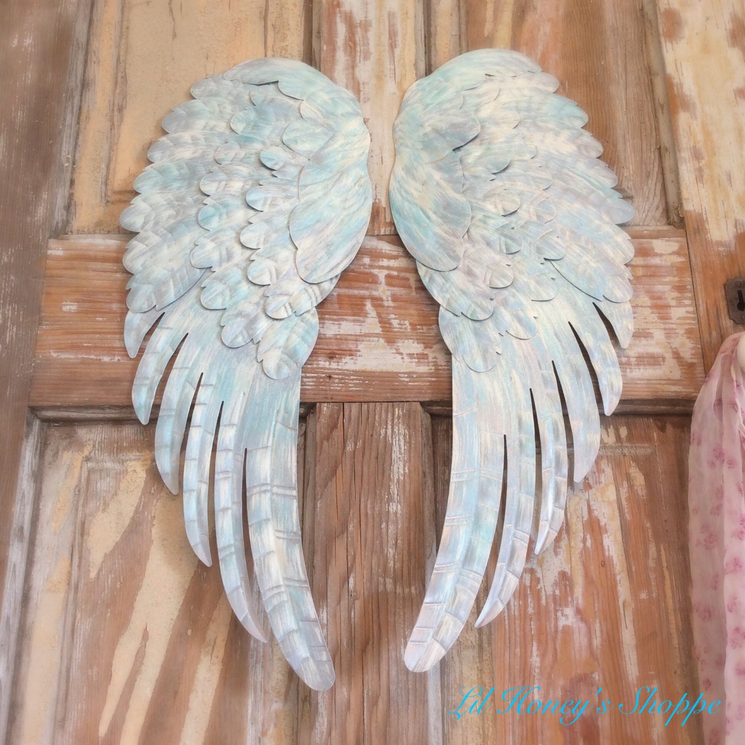 Large metal Angel wings wall decor distressed blue Ivory