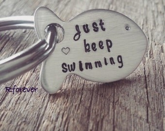 Just Keep Swimming on split ring, aluminum fish