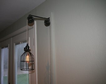 Pipe Lighting - Industrial Pulley Wall Mount Light with Black Metal Socket and Black Cage - Wall Sconce