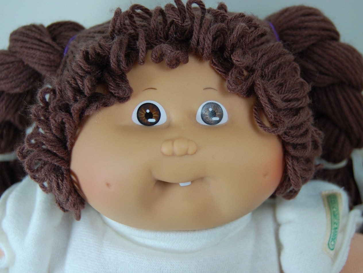 cabbage patch kid with brown hair