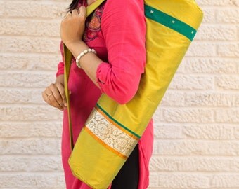 Yoga Mat Bag. Top Loading Yoga Bag. Great as Holiday, travel, yoga gift. Pocket and lining inside. Fits regular yoga mats.