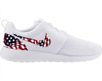 View Ladies White And Red Nike Trainers Background