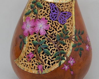 Carved gourds, gourd art, pink flowers, green flower vine, spring blossoms, purple butterfly, filigree, carved relief, carved butterfly