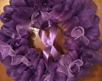 Purple wreath with two different types of purple mesh & some purple ribbon