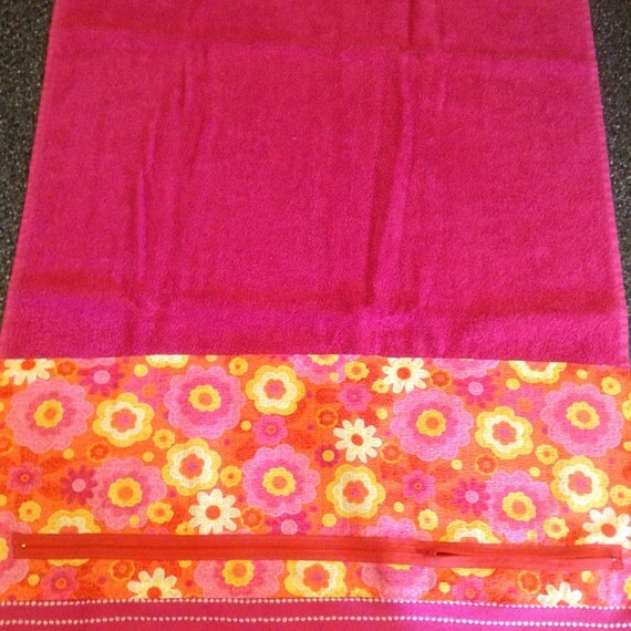 Beach towel with zippered pocket