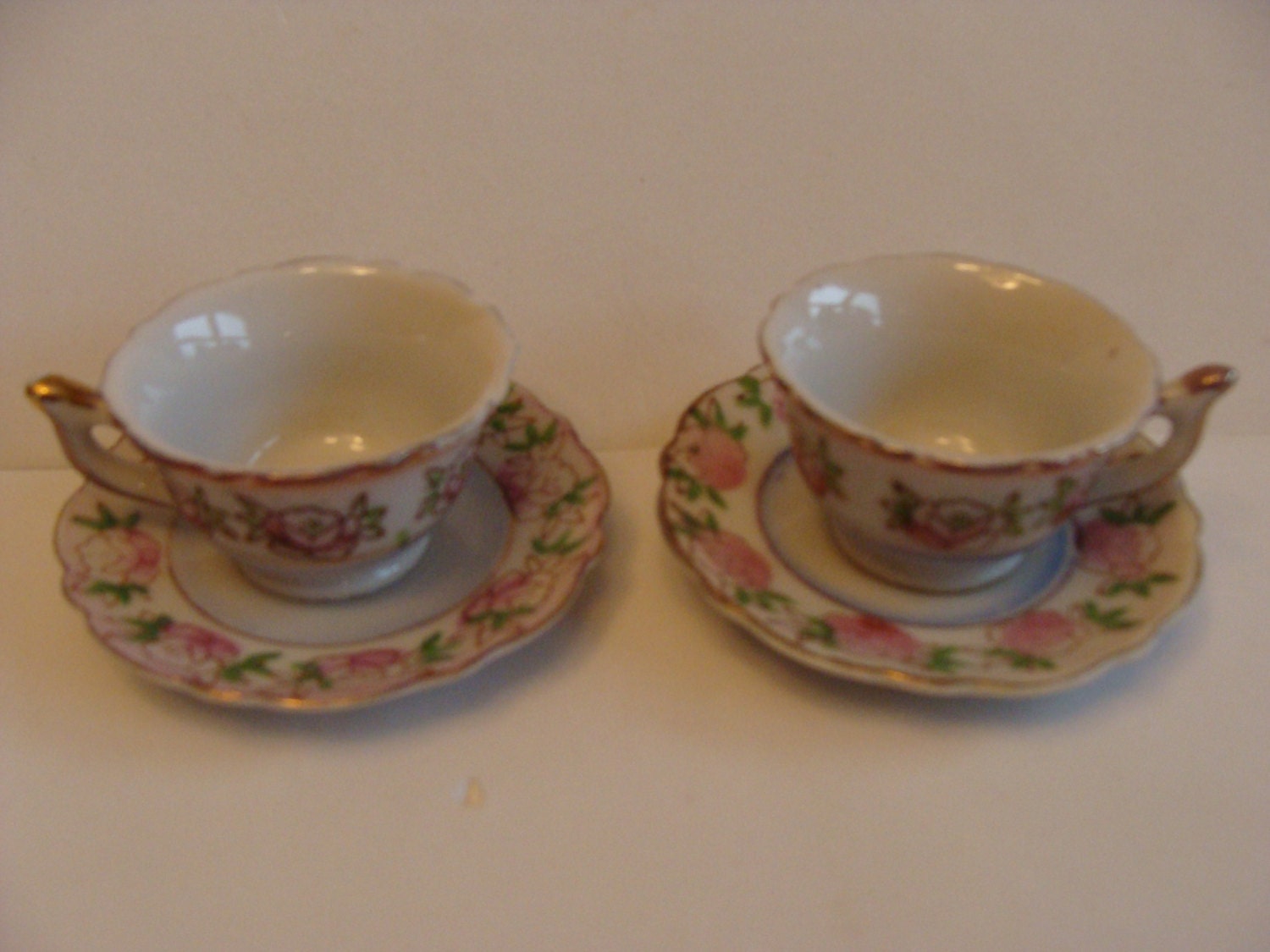 miniature porcelain tea cups and saucers