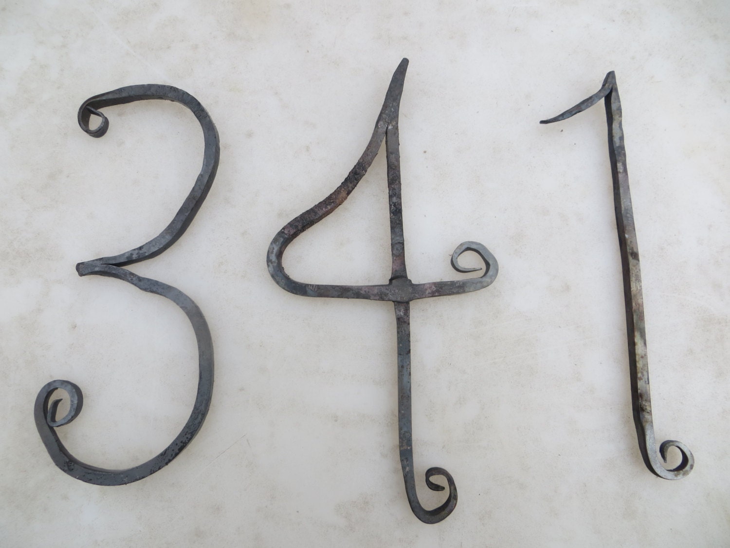 Hand custom iron house numbers by