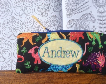 Dinosaur Personalised Pencil Case, zipped bag. Fully-Lined. Use For Pencils, Make-Up, Trinkets Or Jewellery. Personalised with your name.