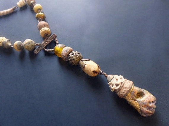 Recondite. Chunky rustic assemblage necklace in golden amber brown. 