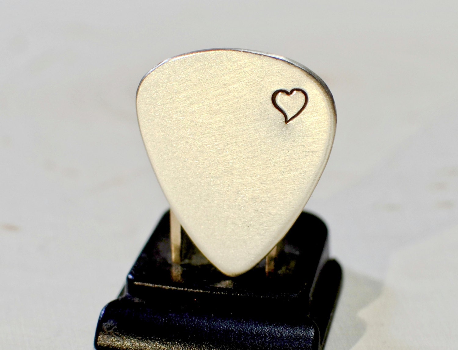 Sterling silver guitar pick brimming with love and a by NiciLaskin