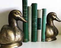 Popular items for brass bookends on Etsy