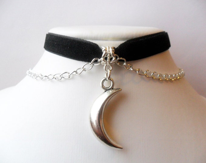 Velvet choker with moon crescent pendant and a width of 3/8”Black Ribbon Choker Necklace