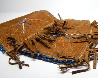 Vintage Iroquois or First Nations beaded leather wrist cuffs. 8x6