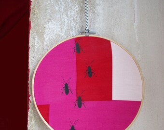Cockroaches, embroidery hoop art, screen printed by hand