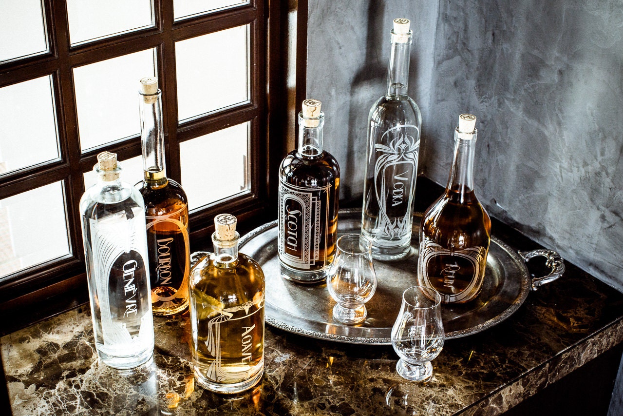 The Variance Set of 4Etched Glass Spirit DecantersStyle your