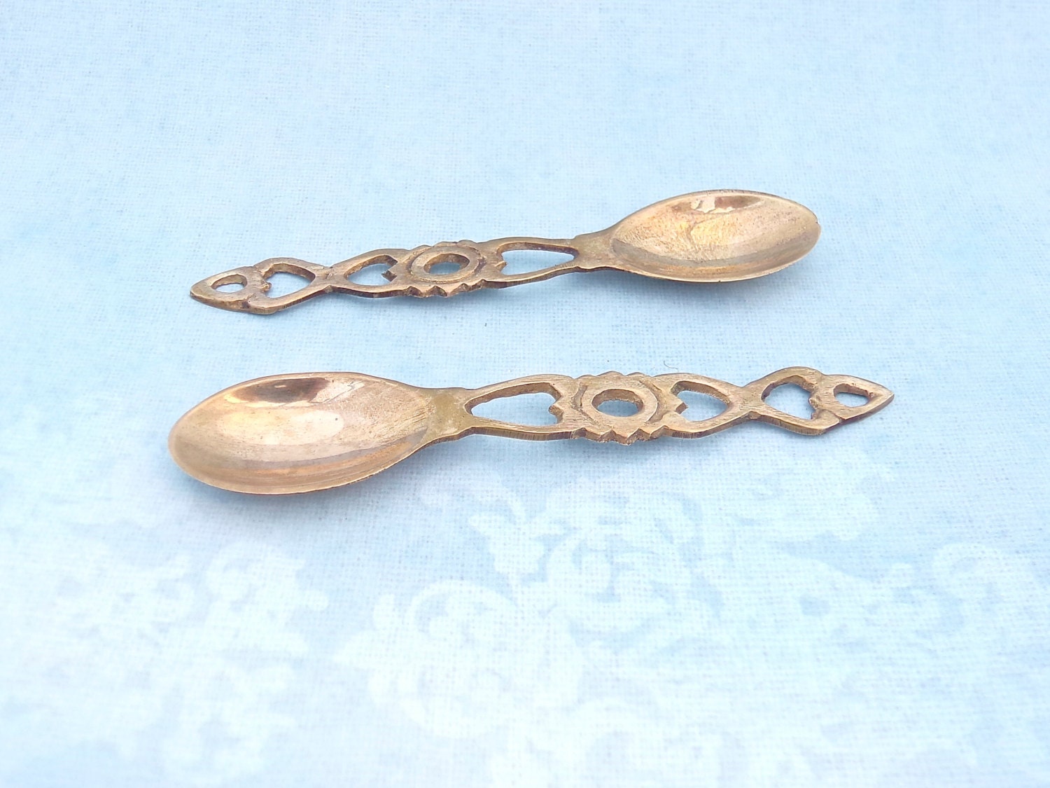 Pair of Small Brass Decorative Spoons Welsh Love Spoons