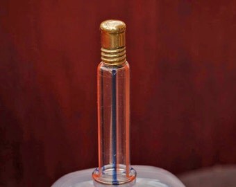 Nice little Early 1900 Perfume Bottle with ground glass stopper.