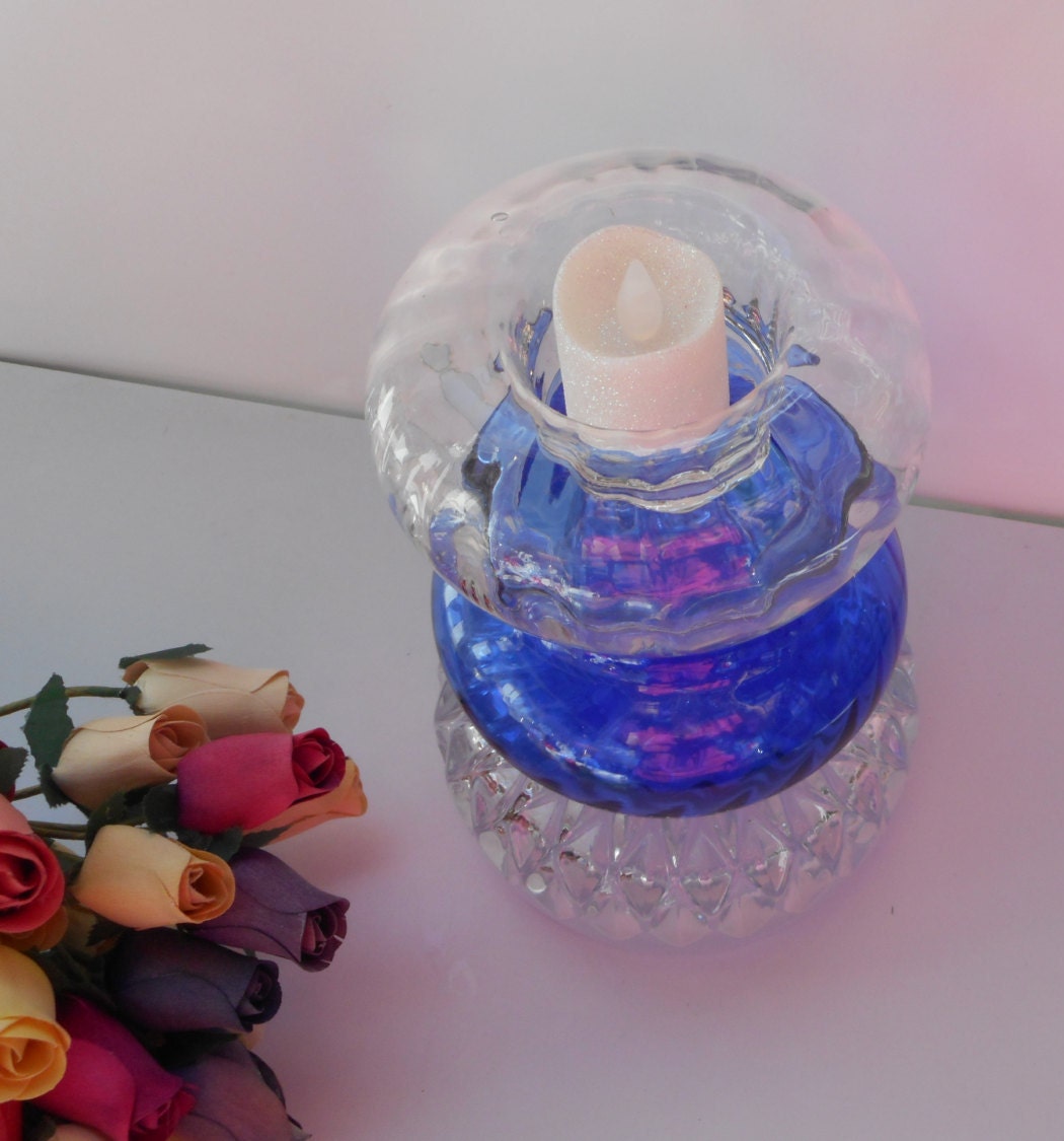 Enjoy this Beautiful sparkling vintage blue tea light holder