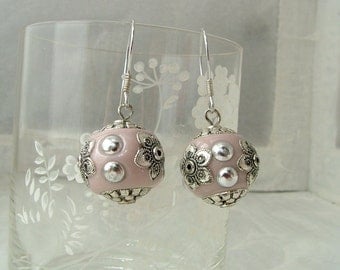 Pink earrings with ceramic beads