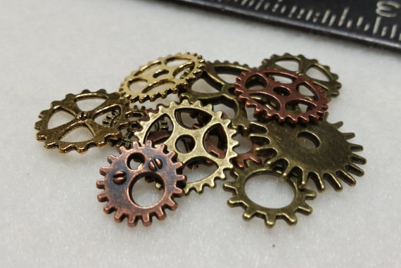 Steampunk Crafting Gears: lot of 12 Small Metal Clockwork Gears, brass, copper, bronze. Weathered Steam Punk Costume Jewelry Accessories by TheSkimDotNet steampunk buy now online